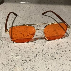 Rose colored never worn (new) sunglasses by Tanqeray